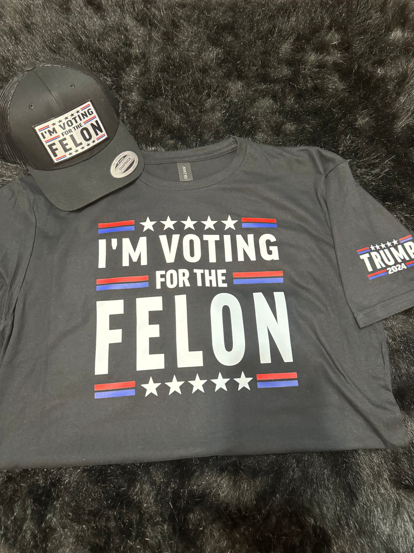 I’m voting for the felon T shirt