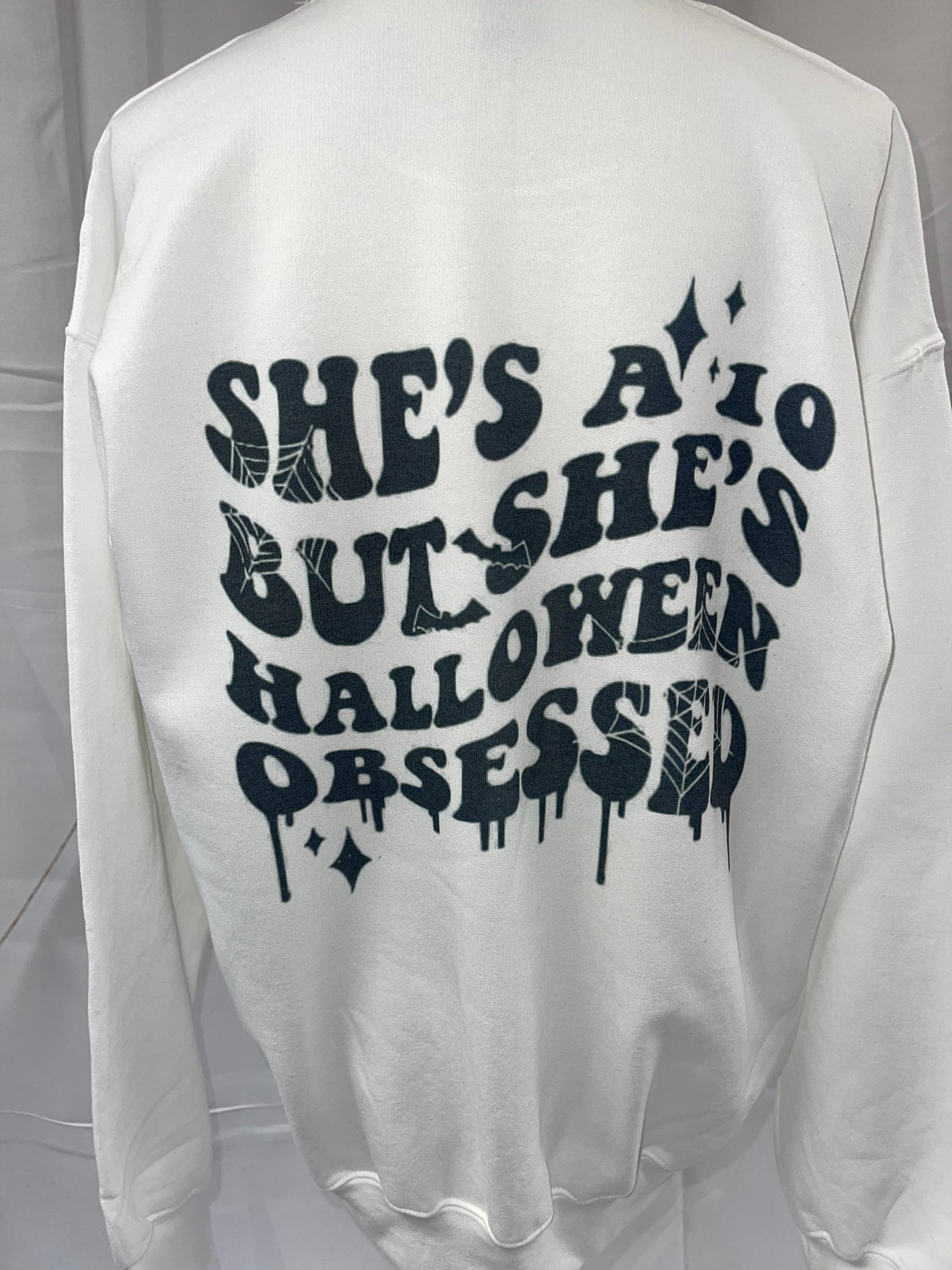 She’s a 10 buts she’s Halloween obsessed sweater 🖤