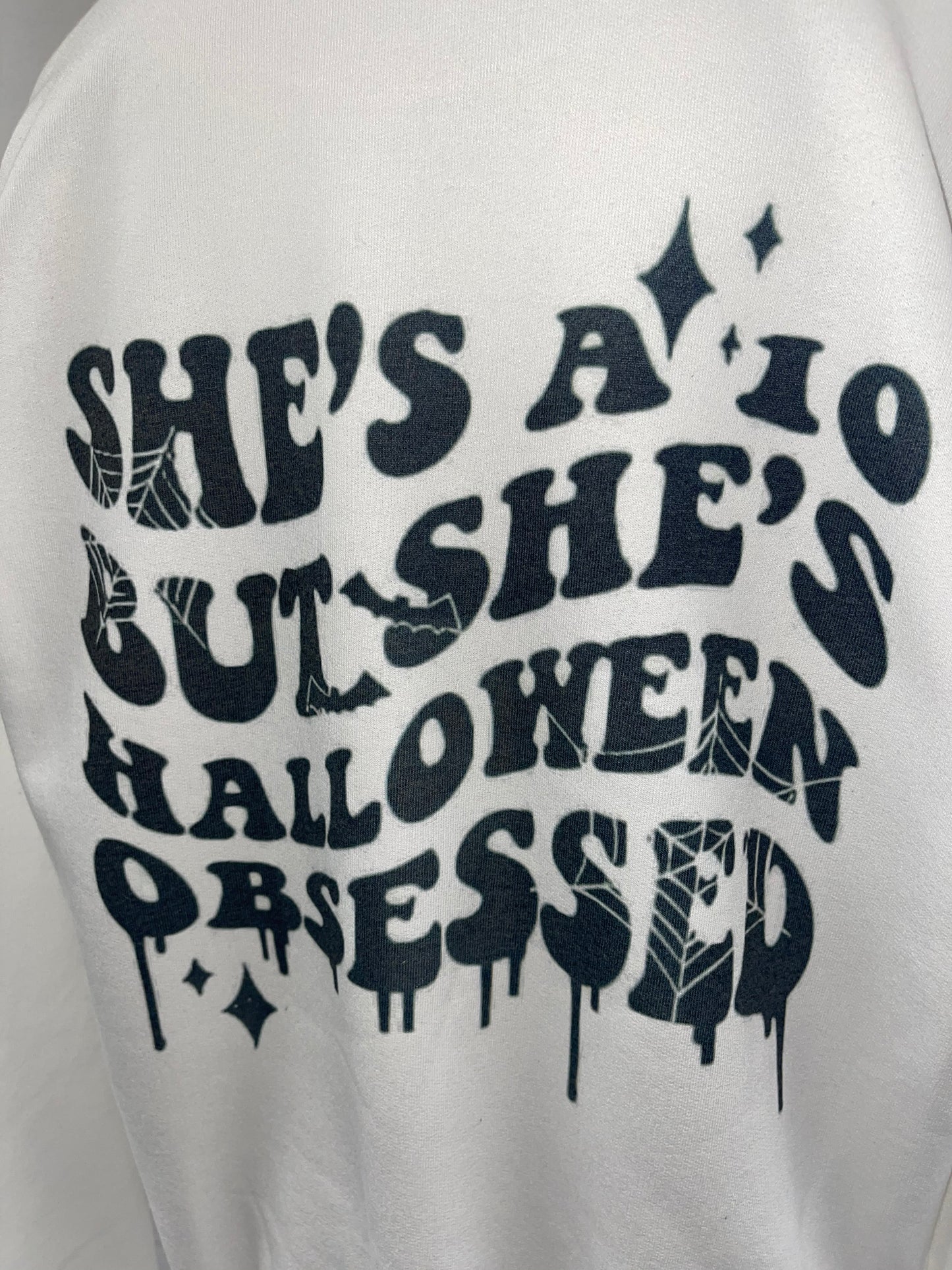 She’s a 10 buts she’s Halloween obsessed sweater 🖤