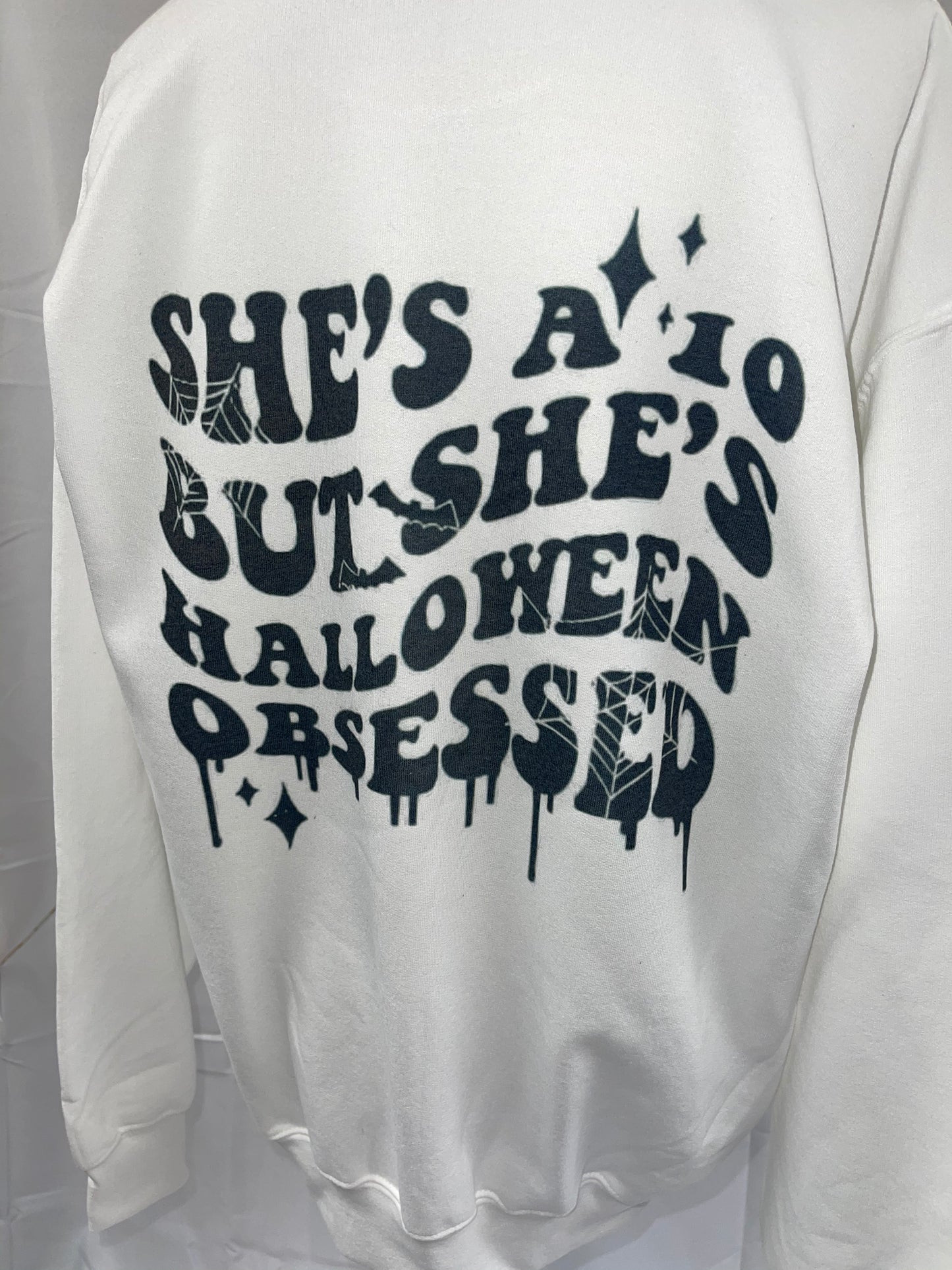She’s a 10 buts she’s Halloween obsessed sweater 🖤