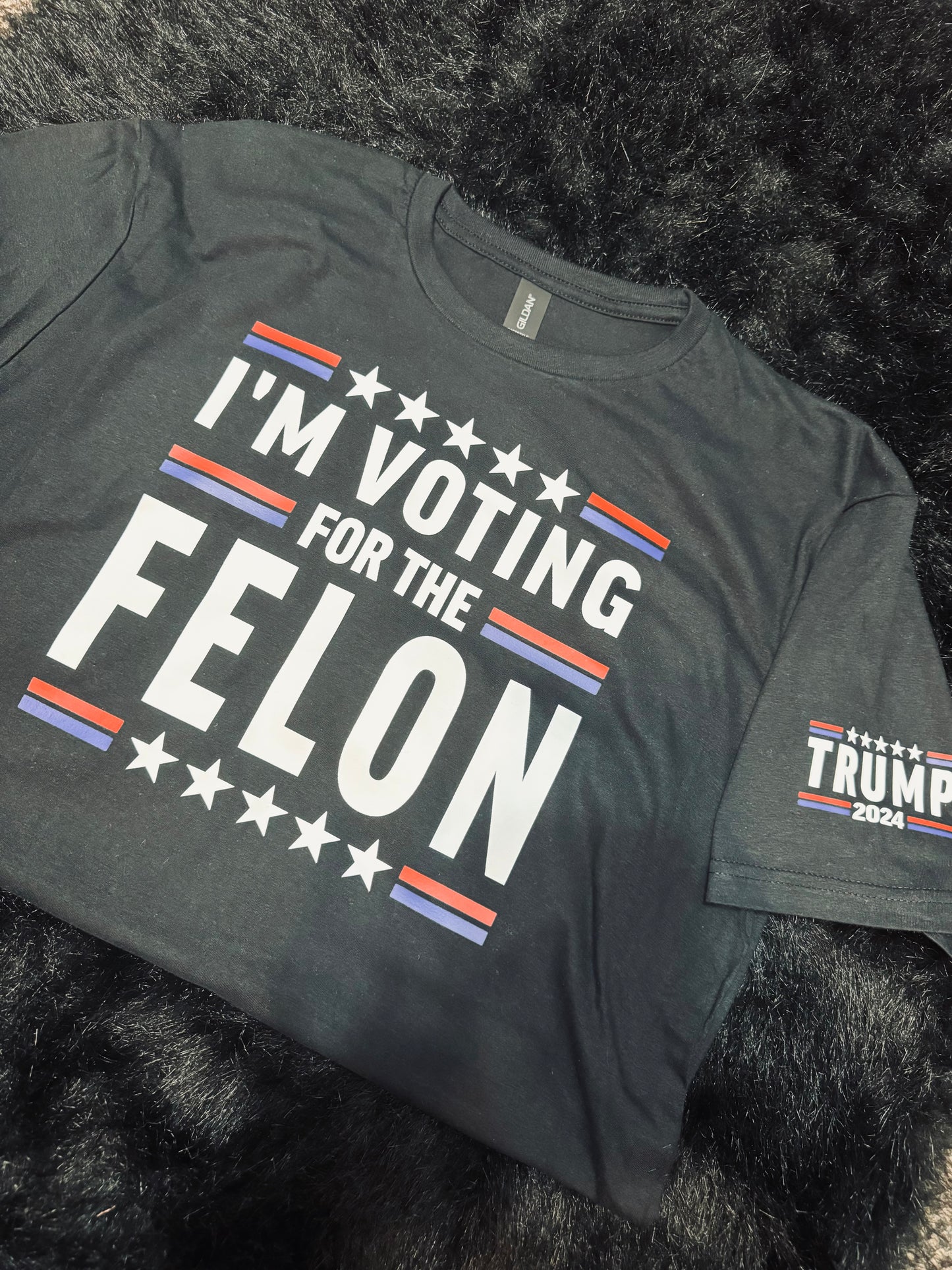 I’m voting for the felon T shirt